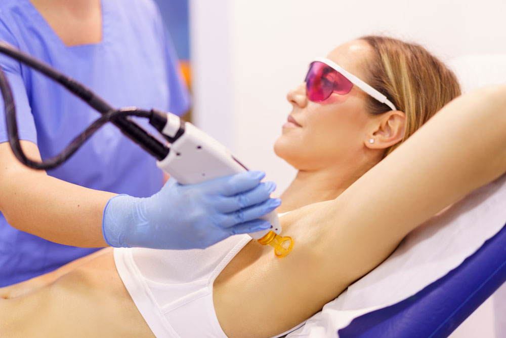 woman-receiving-underarm-laser-hair-removal